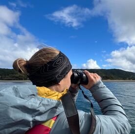 Traveler with binoculars